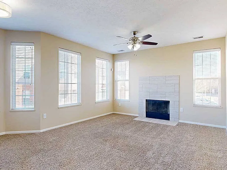 Our 3-bedroom Milan has a spacious living room that features ample natural light.