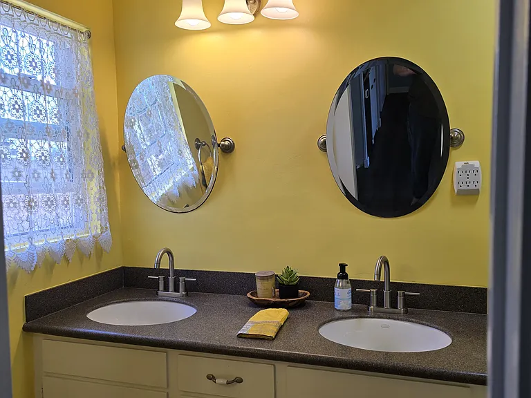 Bathroom with new paint and fixtures.