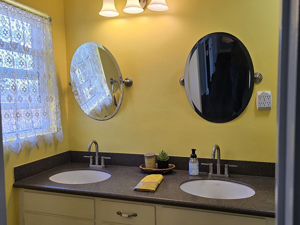 Bathroom with new paint and fixtures.