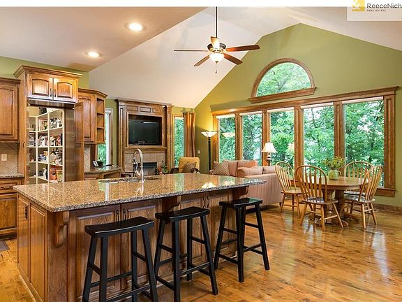 Great kitchen island and as you can see this is one opening to the huge pantry, the other door opens from mudroom/garage area.