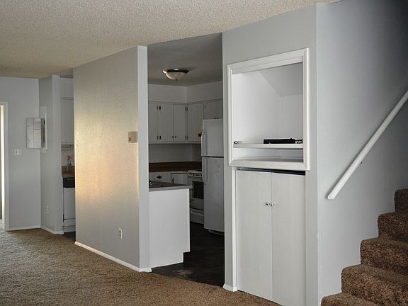 View from living room of kitchen and dining area
