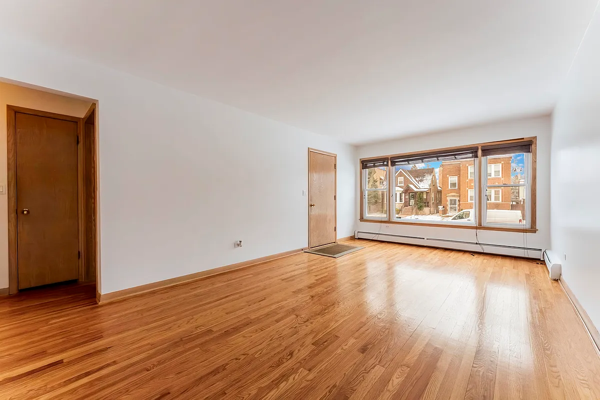 Building Photo - 4936 N Marmora Ave #1