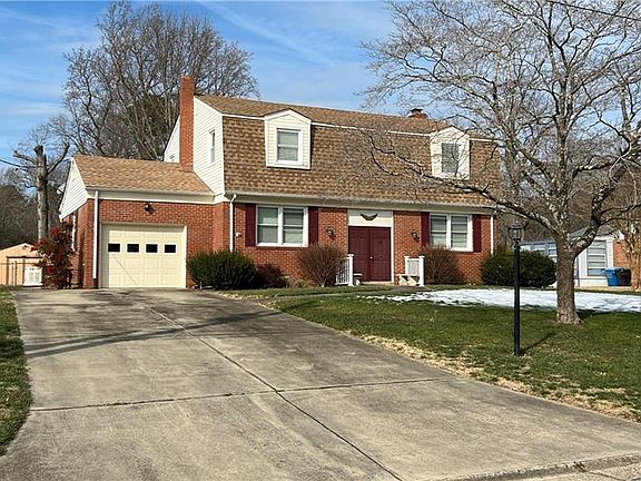 View of house with super long driveway