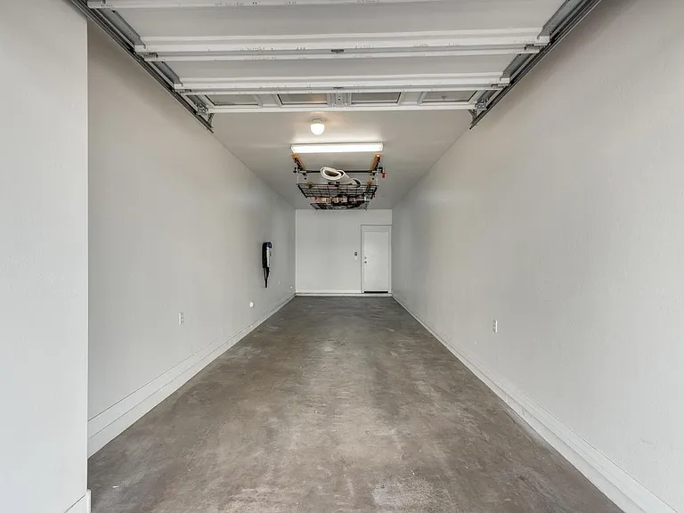 Tandem secured garage with entry into unit