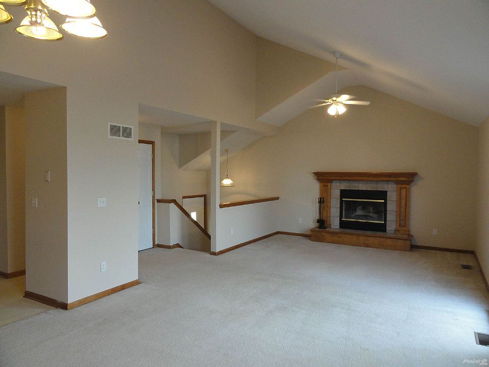 Living Room with wood burning Fireplace