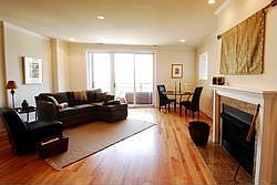 View of living room and dining room from front entry.