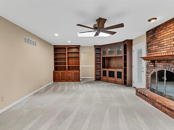 Family room with custom shelving