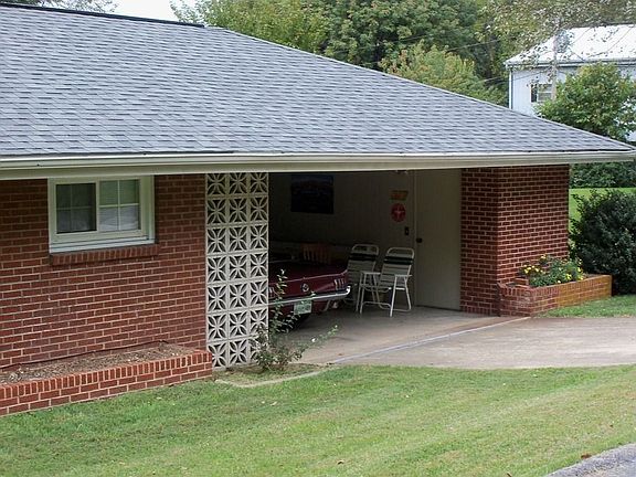 Carport on back of house with 2nd driveway