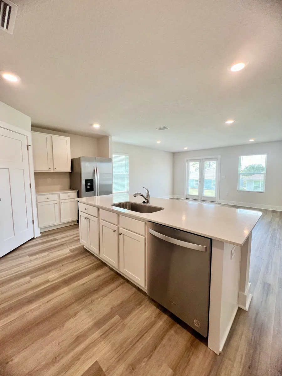 View from kitchen to dining area - 4899 Snipe Rd