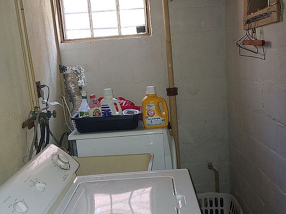 Deep sink in laundry room.