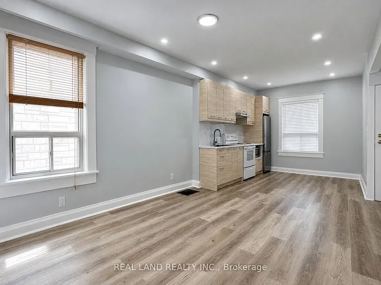 225 Coxwell Ave #MAIN FLOOR — Photo 1