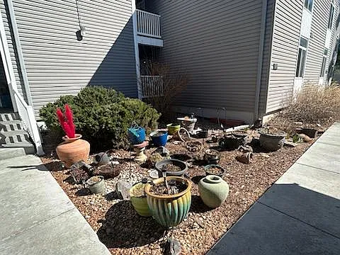 Ample space in front of the unit allows for pots and pots of flowers or veggies.