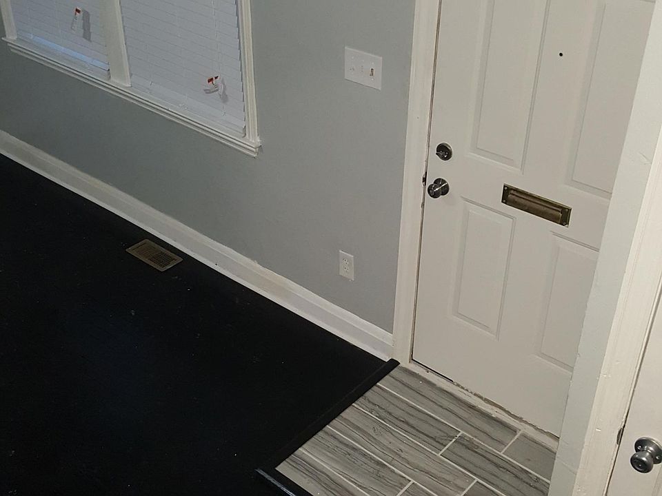 Custom entry way! Custom blinds throughout!
