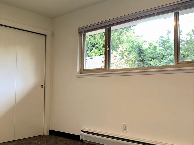 West bedroom view of closet and window