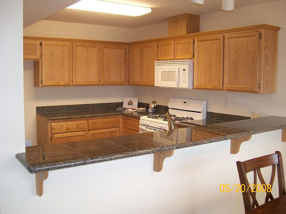This unit has Granite Tile Counter Tops