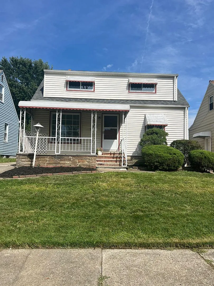 955 E 223rd St | Spacious 3-Bedroom, 1.5-Bath Home with Garage — Photo 1