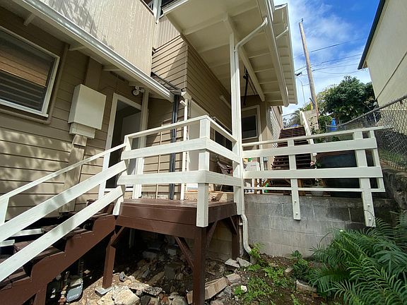 Side entrance and back door