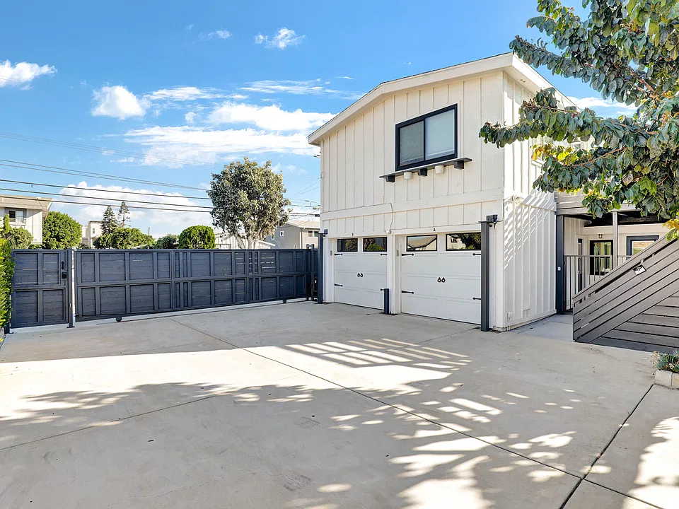 View of garages. Each unit has its own one car garage behind the private gate with opener.