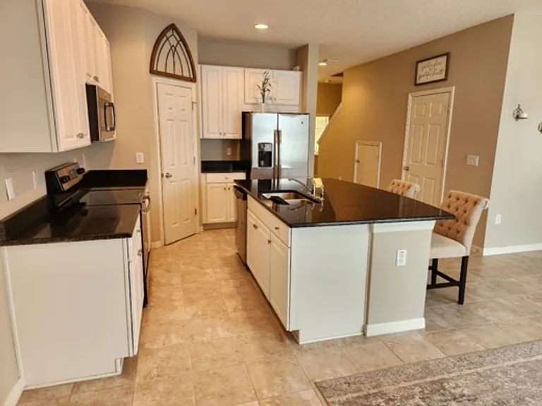 7031 Woodchase Glen Dr — Photo 4