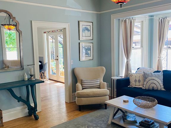 living room with wall mounted 54" TV