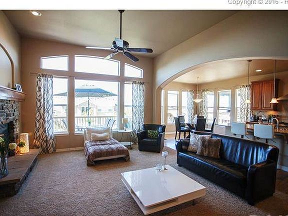 Living Room with cultured stone gas fireplace