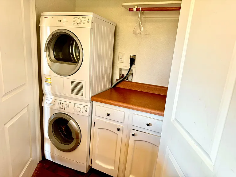 Compact laundry very conveniently located in family room