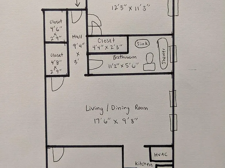 floor plan showing closets, windows, and measurements