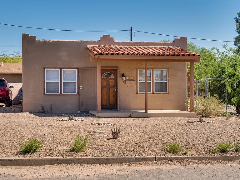 Front House with ample street parking in front.