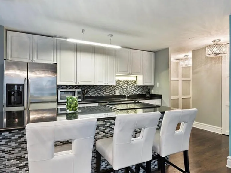 Kitchen with granite countertops and stainless steel appliances
