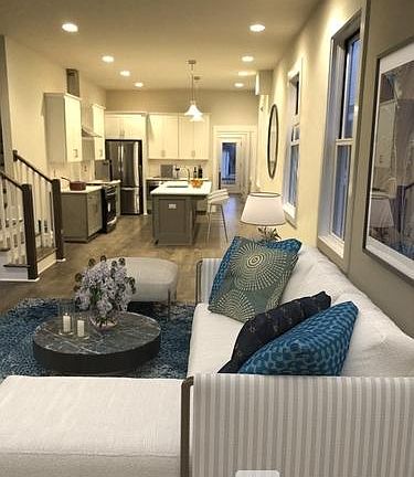 Living Room and is open floor to the Kitchen