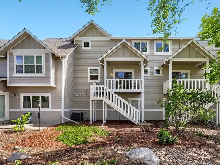 Back of townhouse, deck and backyard