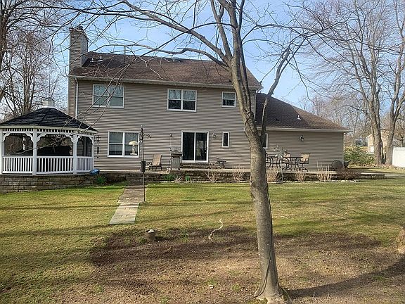 Screened gazebo with fan