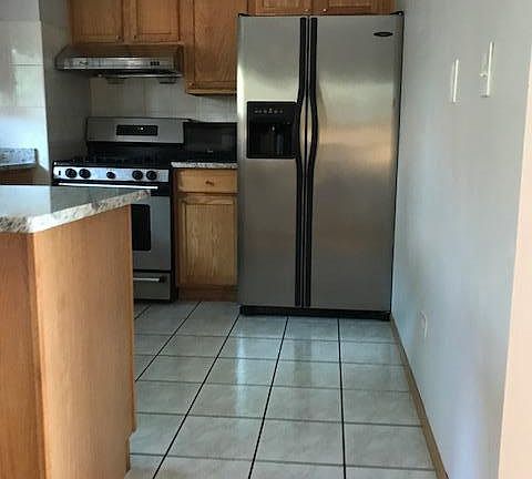 Stainless steel appliances in kitchen