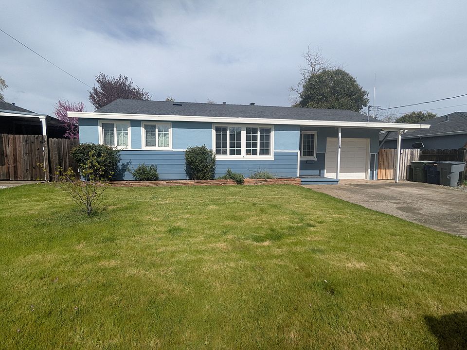 Landscaped yard. 1 car garage and 2 car Driveway.
