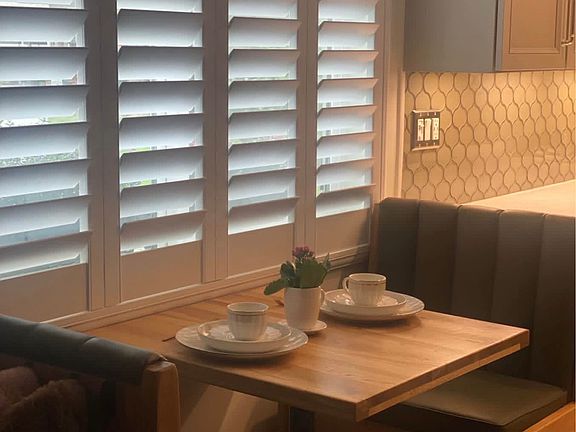 Custom dining nook with booth seating. Perfect for work-from-home or casual dining.