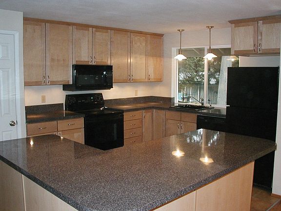 spacious kitchen with lots of counter and cabinet space