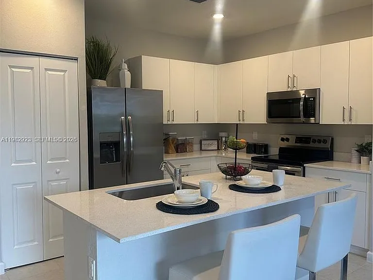11883 NW 47th Mnr #11883 — Photo 1