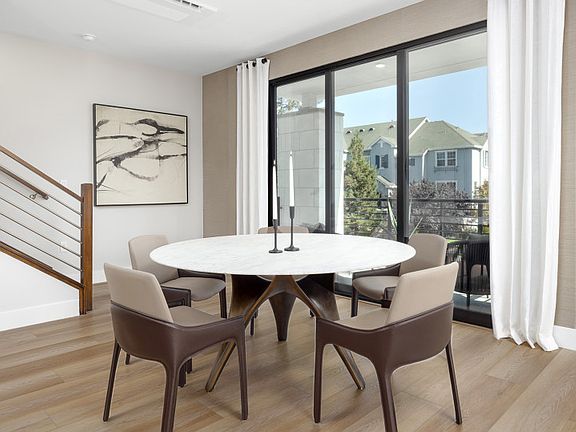Beautiful dining area with balcony access
