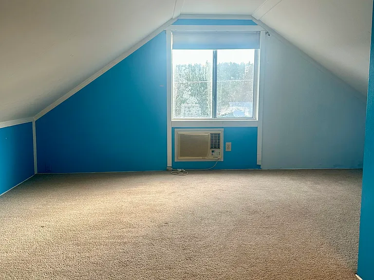 3rd bedroom looking out at the window.