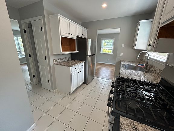 kitchen: if you walk straight you go into the dining area, where the closet is the washer and dryer and half of bath across from the laundry