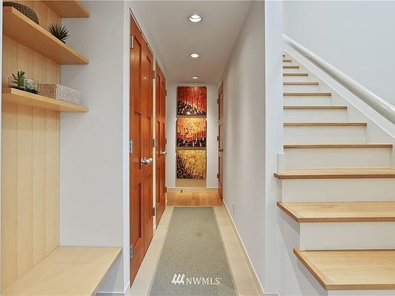 Foyer is sure to wow your guests with ceramic floor, top-notch finish work and built-in bench with shoe storage below. To the left are two closets for coats and shoes. Under the staircase, you will find extra deep storage as well. 