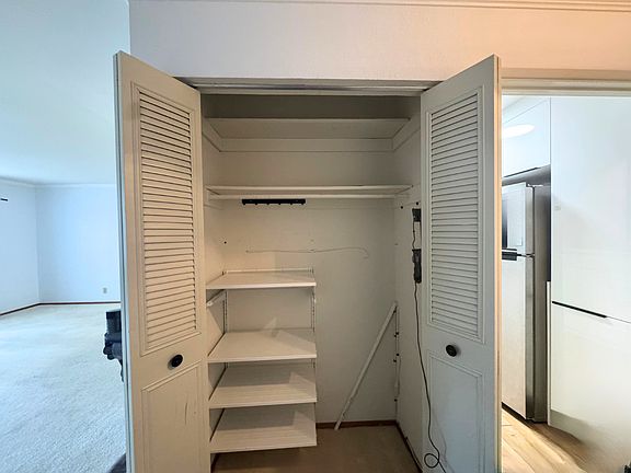 Entry Way Closet with built in shelf