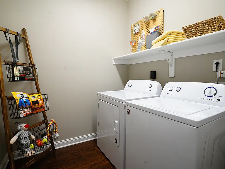 Laundry day made easy with a full-size washer and dryer in every home _ no quarters, no waiting.