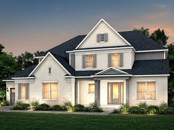 Barrington Exterior 16 features brick, hardie siding, covered front porch and 3 car sideload garage