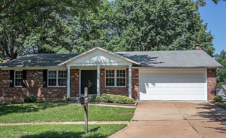 Impressive curb appeal, mostly brick