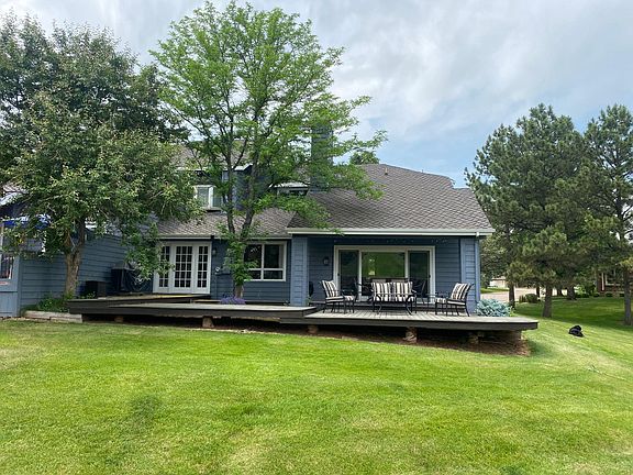 Back of home showing expansive deck
