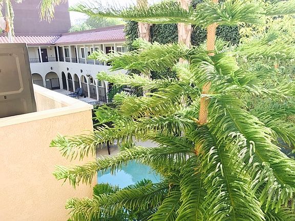 3rd image of 9825 Topanga Canyon Boulevard # Top Floor