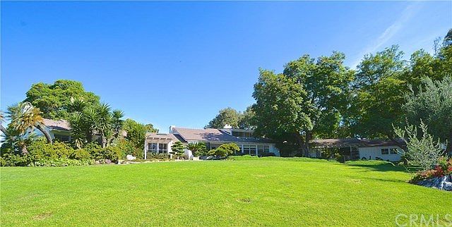 CLASSIC ROLLING HILLS RANCH VIEW HOME LOCATED ON RELATIVELY FLAT 3.4 ACRE LOT