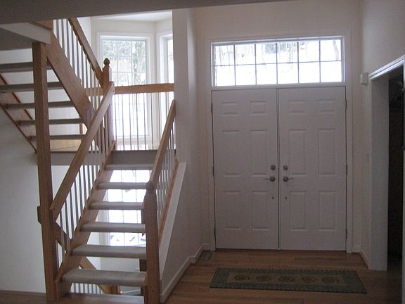 Front entrance & open stairs