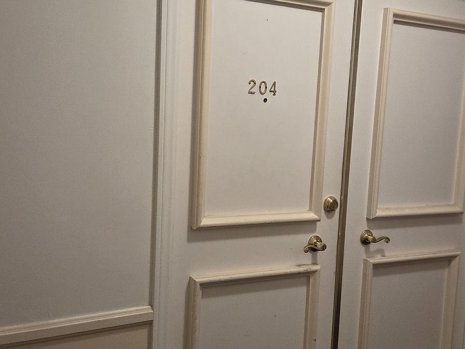 Entry to the Unit #204 - second floor, corner unit. very comfortable being on the second floor - doesn't get got unlike the third floor units, Balcony at the canopy level of trees bringing good breeze!